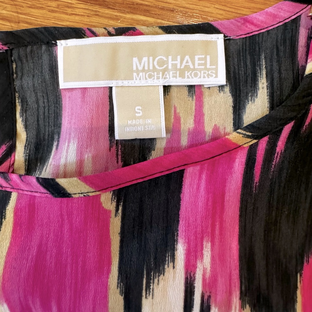 Like new Michael Kors cold shoulder, multicolored top.